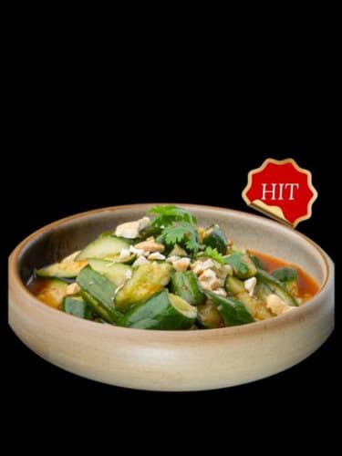 Огурцы битые с чесноком и орешками